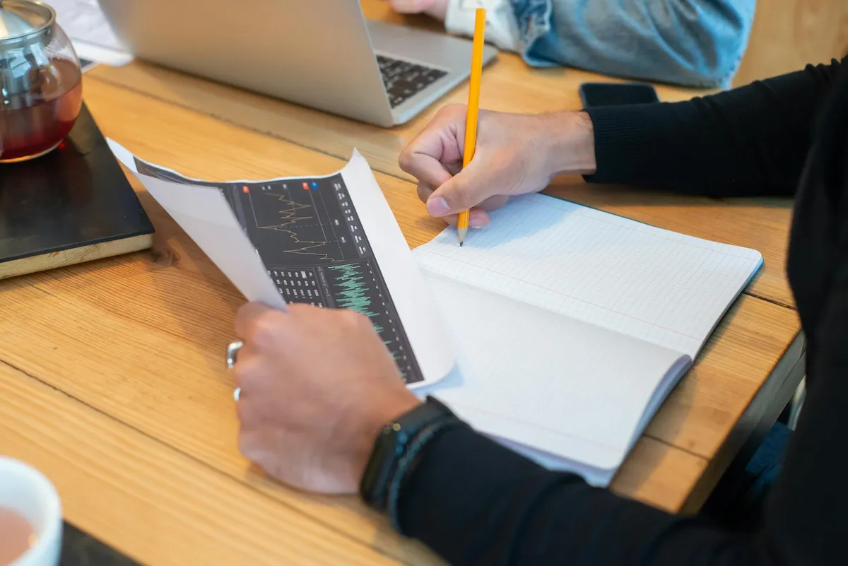 Multi-product break-even analysis table with weighted contribution margins