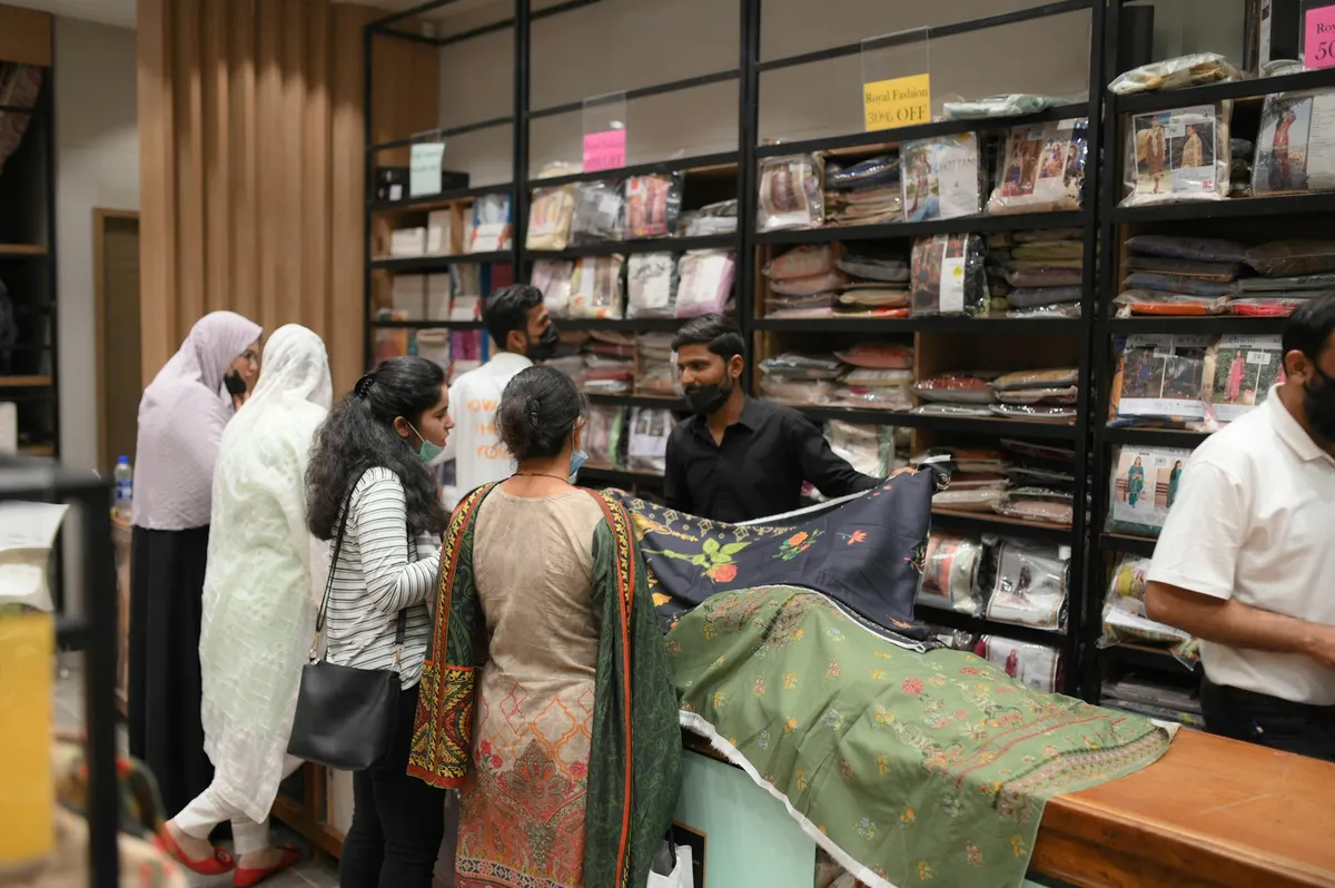 Customer browsing ecommerce store on mobile phone