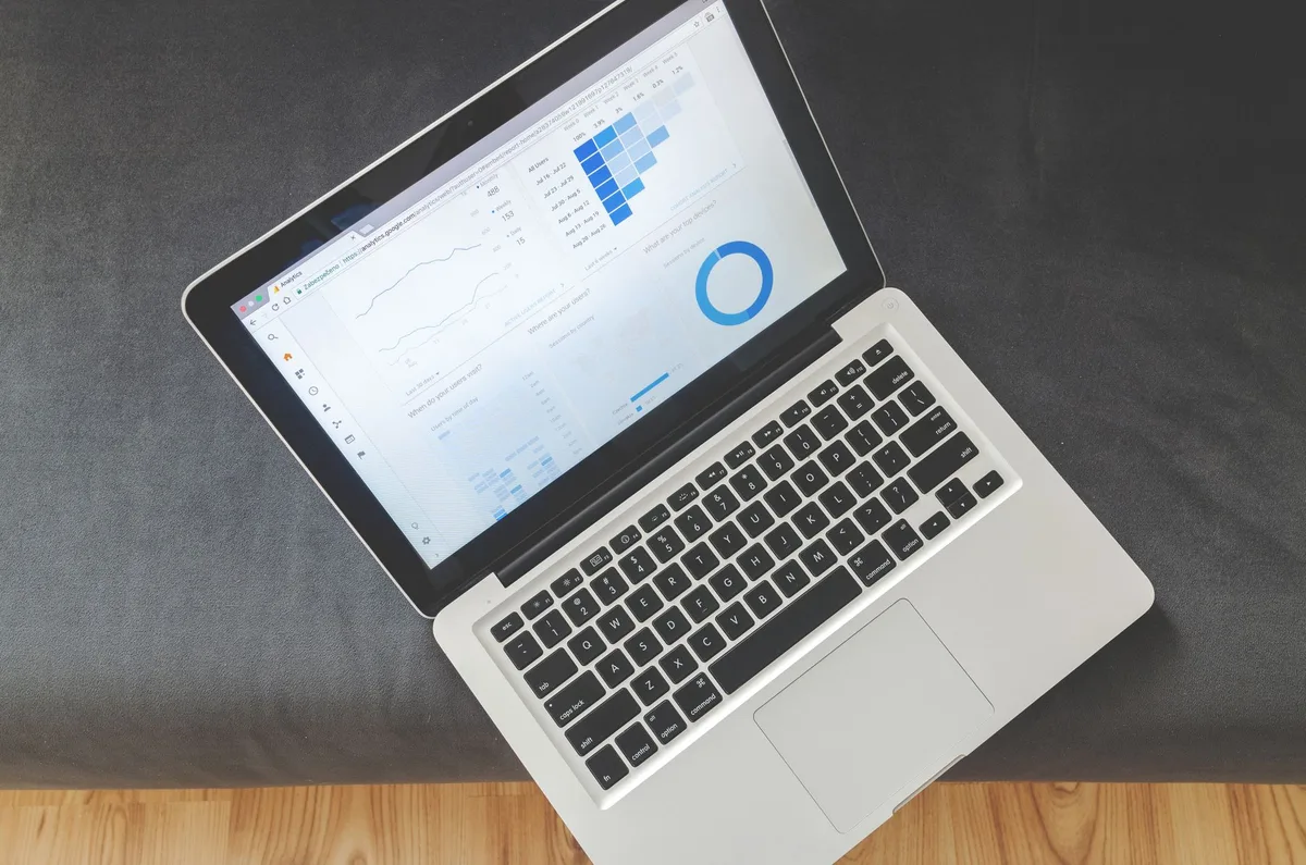 email marketing analytics dashboard showing campaign performance on laptop screen